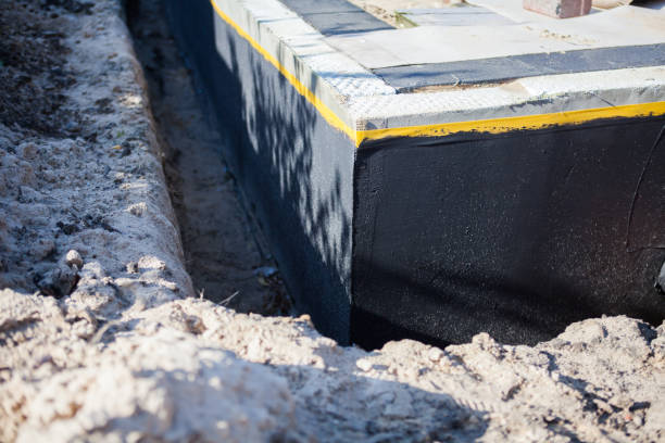 Professional Waterproofing technician working in Saint Paul, IN